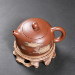 Nixing Clay Xishi Teapot, Mountain Landscape Line-Carving