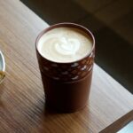 Nixing Pottery Travel Coffee Mug, Hand‑Embossed Galloping Horse with Leather Sleeve
